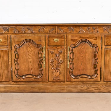 French Provincial Louis XV Carved Oak Sideboard in the Manner of Baker Furniture