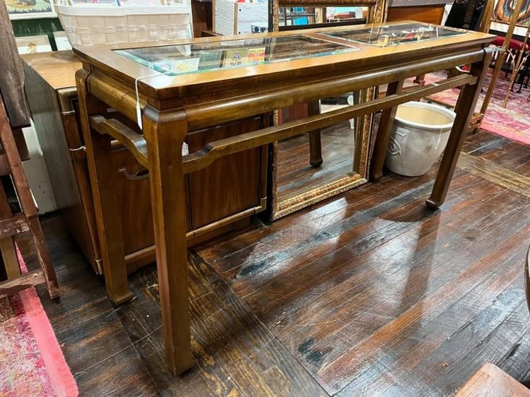 Asian style glass top console table. 52” x 14” x 28”