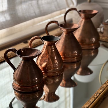 Set of 4 antique english copper measuring pitchers/jugs 
