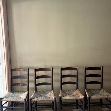 Ladder back rush seat chairs. Sold in pairs.