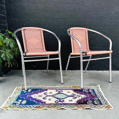 Pink Vinyl Reed And Chrome Armchairs