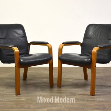 Ekornes Blue Leather and Teak Lounge Chairs - A Pair 