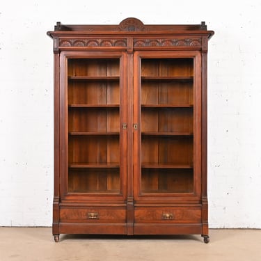 Herter Brothers Style Antique Eastlake Victorian Carved Walnut Bookcase, Circa 1880s