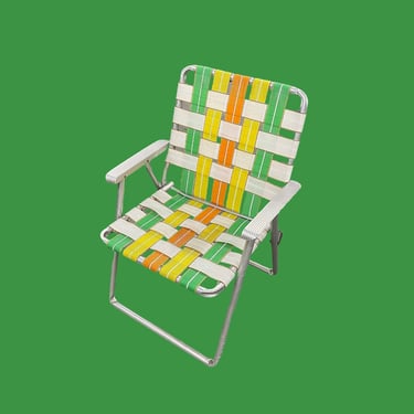 Vintage Lawn Chair Retro 1970s Mid Century Modern + Silver Aluminum Frame + Webbed Seat + Green + Yellow + Orange + Metal Armrests + Folds 