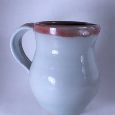Ceramic Pitcher- Handmade Stoneware with a celadon glaze and cranberry glaze 