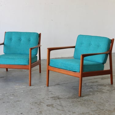 Pair of Danish Modern Dux USA75 Chairs designed by Folke Ohlsson Sweden 