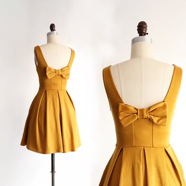 JANUARY | mustard yellow short bridesmaid dress with bow. vintage style short yellow party dress with pockets. 1960s mod retro summer 