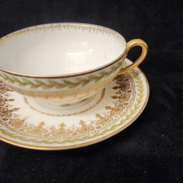 Green and Gold Limoges Porcelain Cup and Saucer