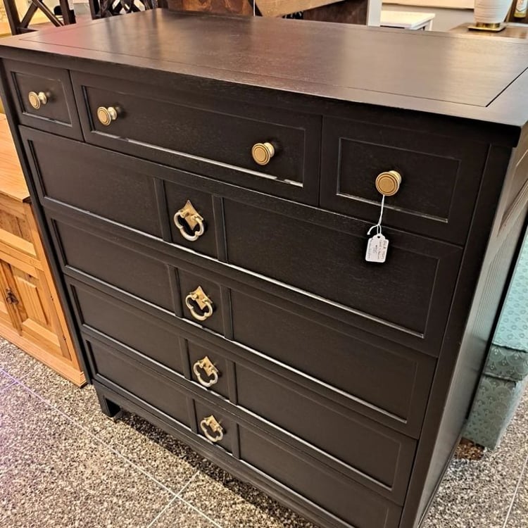 Sophisticated black chest-of drawers. Measures 40 wide X 20 deep X 44 high.