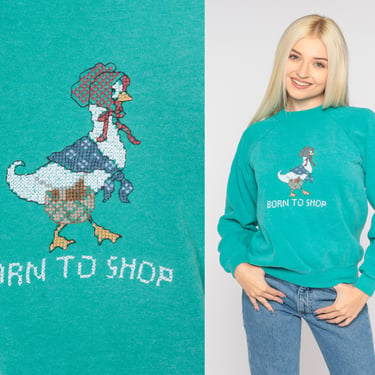 Born To Shop Sweatshirt 90s Cross-Stitch Duck Sweater Funny Shopping Animal Goose Pullover Crewneck Raglan Sleeve Green Vintage 1990s Medium 
