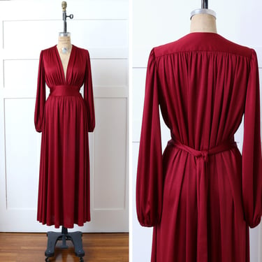 vintage vixen 1970s ruby red dress • glam full length sexy low cut draped jersey dress • bishop sleeves & caped back 