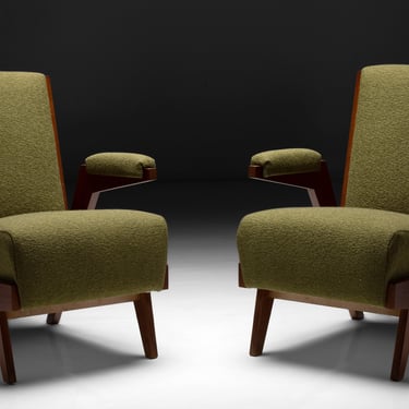 Armchairs in the style of Pierre Jeanneret