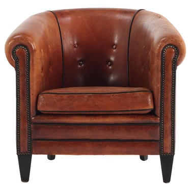 A Patinated Sheepskin Leather Club Chair, C. 1950 from Holland.