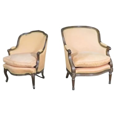 Mated Pair Similarly Upholstered French Carved Walnut Louis Bergere Chairs