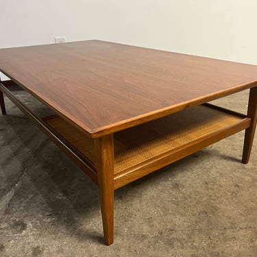 The Perfect Mid Century Walnut and Cane Coffee Table with Magazine shelf, Refinished. 