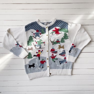 white Christmas sweater 90s vintage Orvis winter sports skiing ice skating sledding novelty embroidered cardigan 