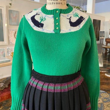 Early 80s style: Preppy monogrammed sweaters in kelly green and