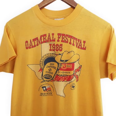 vintage t shirt / Texas t shirt / 1980s Texas Oatmeal Festival 1986 cowboy hat thin yellow Hanes t shirt Small 