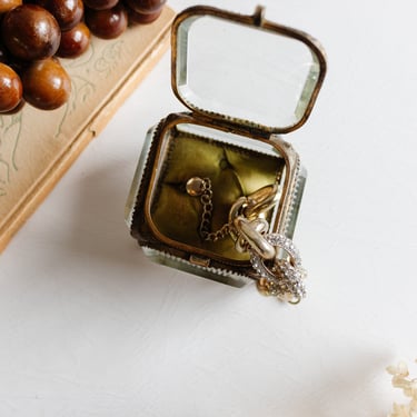 antique french beveled glass and ormolu bijoux casket with sage cushion