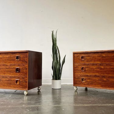 Danish rosewood three drawer low dressers on rolling casters 
