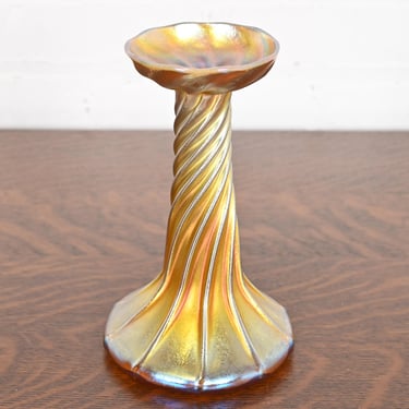 A gorgeous Arts & Crafts or Art Nouveau period Favrile iridescent art glass candlestick By Louis Comfort Tiffany for… Art Deco Louis Comfort Tiffany Favrile Iridescent Art Glass Candlestick For Sale – Image 3 of 12 Tiffany Studios Louis Comfort Tiffany Favrile Iridescent Art Glass Candlestick For Sale – Image 4 of 12 Early 20th Century Louis Comfort Tiffany Favrile Iridescent Art Glass Candlestick For Sale – Image 5 of 12 Louis Comfort Tiffany Favrile Iridescent Art 