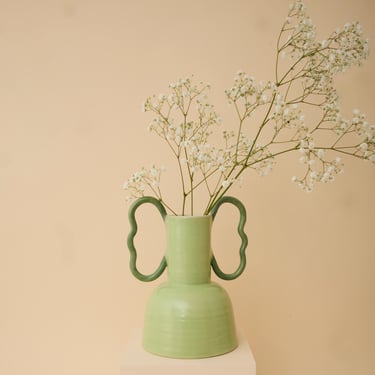 Green handmade ceramic vase with wiggle handles 