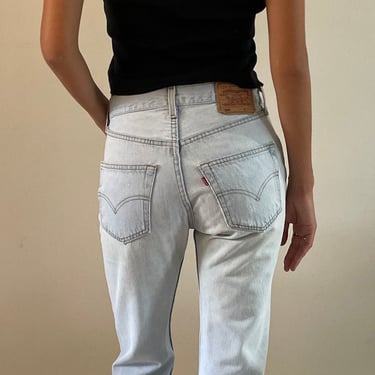 90s Levis 501 faded jeans / vintage light stone wash faded soft worn in high waisted button fly boyfriend Levis 501 jeans USA | size 27 