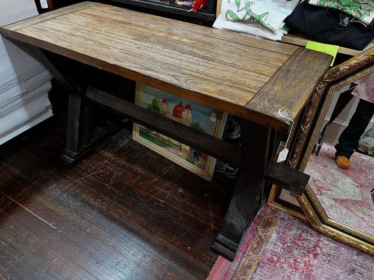 Rustic trestle style table. 48” x 19” x 29” 