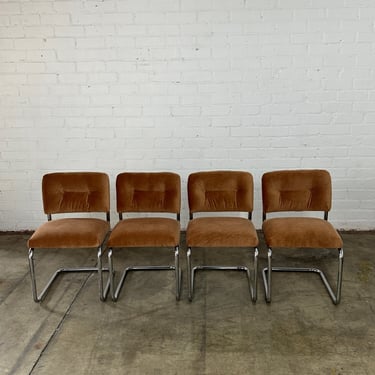 Cantilevered dining chairs - set of four 