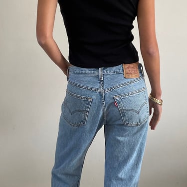 30 Levis 501 vintage jeans / vintage light medium wash faded soft worn in high waisted button fly boyfriend Levis 501 jeans USA | size 30 