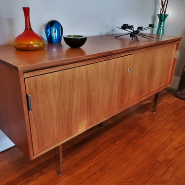 Handsome 1960s Mid century Modern Walnut Credenza with sliding doors