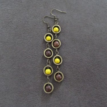 Yellow, wooden, and bronze dangle earrings 