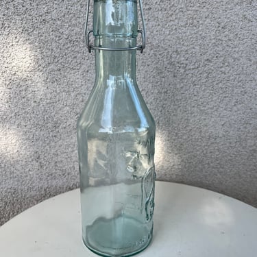 Vintage clear glass 3D Absolutely Pure Milk bottle with wire plastic cap 40 oz. 