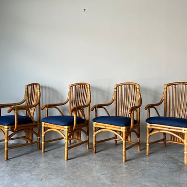 A Set of Four Vintage McGuire - Style Bamboo Arm Dining Chairs W/ Leather Straps 