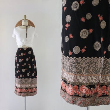 black floral wrap skirt 25-27 