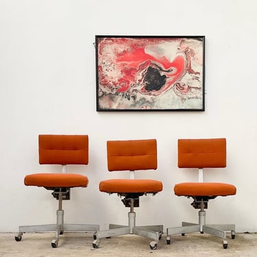 Orange Steel Case Rolling Chairs