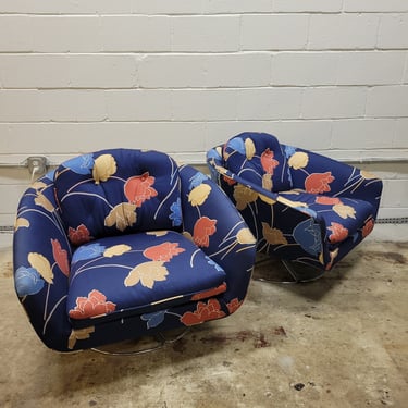 Pair of Mid Century Swivel Arm Chairs