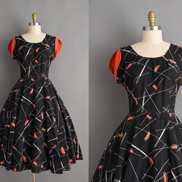 Vintage 1950s Dress | Black Cotton Orange Atomic Novelty Print Sweeping Full Skirt Cotton Dress | Large 