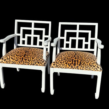 Vintage pair of painted  fretwork with all new velvet leopard upholstery 