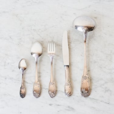 Matched French Flatware set Of 49