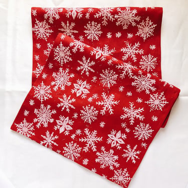 snowflakes on red. block printed linen table runner. entertaining. hostess gift. tablecloth. christmas. holiday decor. snow. holiday party. 