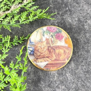 Lounging cat round porcelain brooch 