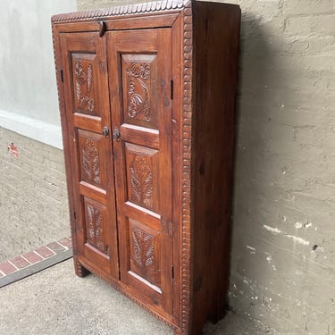 Rustic Carved Cupboard