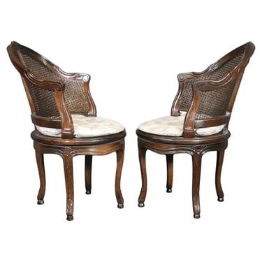 Beautifully Pair of Dark Walnut Cane back and Seated Swiveling Corner Chairs