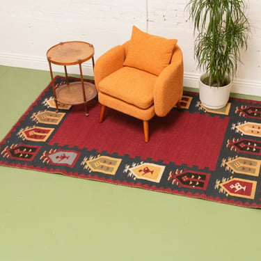 Wool Rug with Printed Border and Tassels