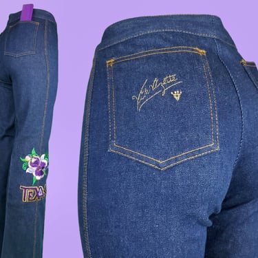 Embroidered 70s Texas jeans by Vik VIZETTE. Purple floral mid rise spell out graphics. Iconic novelty ooak vintage collector. (27 x 32) 