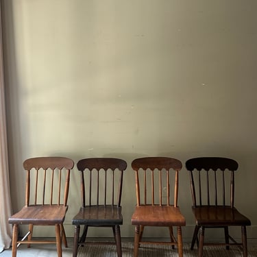 Scalloped mixed wood dining chairs. Sold in pairs.