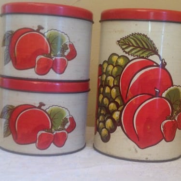 Vintage set of (3) Decoware Stacking Fruit canisters with bright red lids 