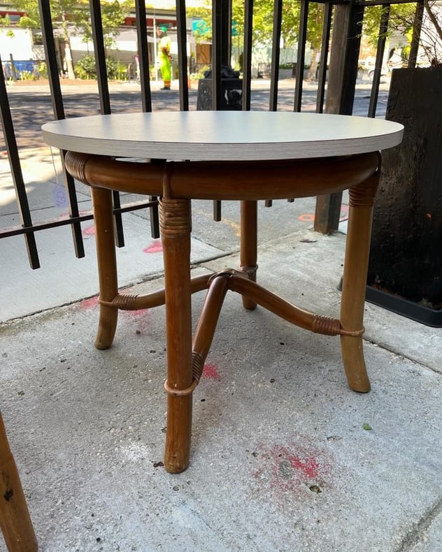 Round bent bamboo coffee table. 24” x 20.5” 