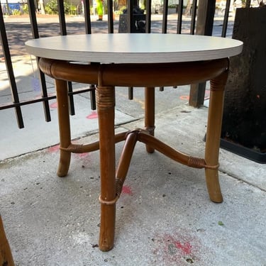 Round bent bamboo coffee table. 24” x 20.5” 